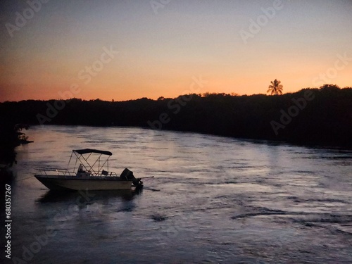 fishing boat at sunset