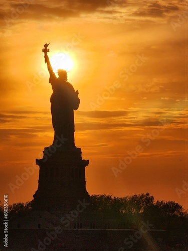 statue of liberty at sunset