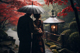 Japanese couple wearing traditional kimono with umbrella in a rainy day