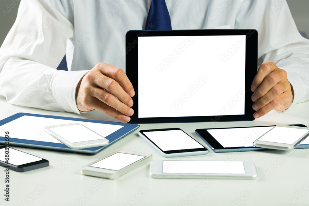 Digital png photo of caucasian businessman with electronic devices on transparent background Digital png photo of caucasian businessman with electronic devices on transparent background