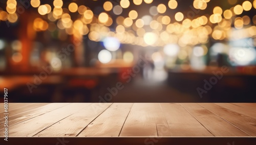 Wooden surface with warm bokeh lights  perfect for festive display backgrounds or intimate dining concepts.