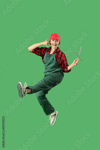 Jumping female worker with ...