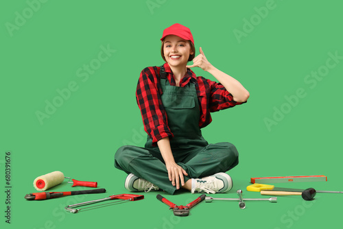 Female worker with tools sh...