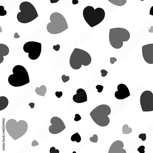 Seamless vector pattern with hearts, creating a creative monochrome background with rotated elements. Vector illustration on white background