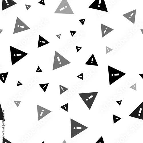 Seamless vector pattern with warning symbols, creating a creative monochrome background with rotated elements. Vector illustration on white background