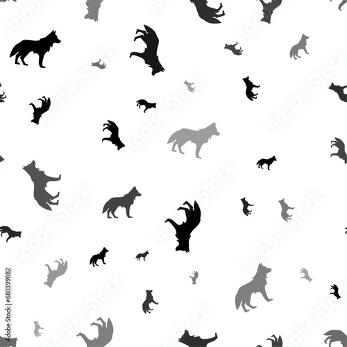 Seamless vector pattern with wolf symbols, creating a creative monochrome background with rotated elements. Vector illustration on white background
