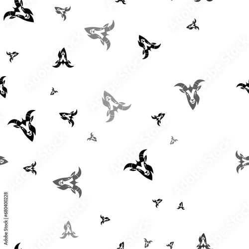 Seamless vector pattern with goat head symbols, creating a creative monochrome background with rotated elements. Vector illustration on white background © Alexey