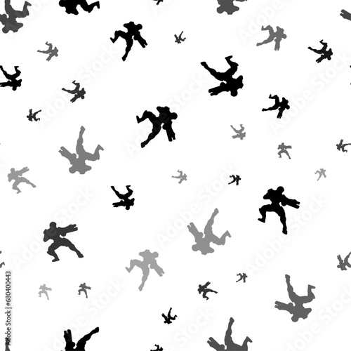 Seamless vector pattern with combat robots, creating a creative monochrome background with rotated elements. Vector illustration on white background
