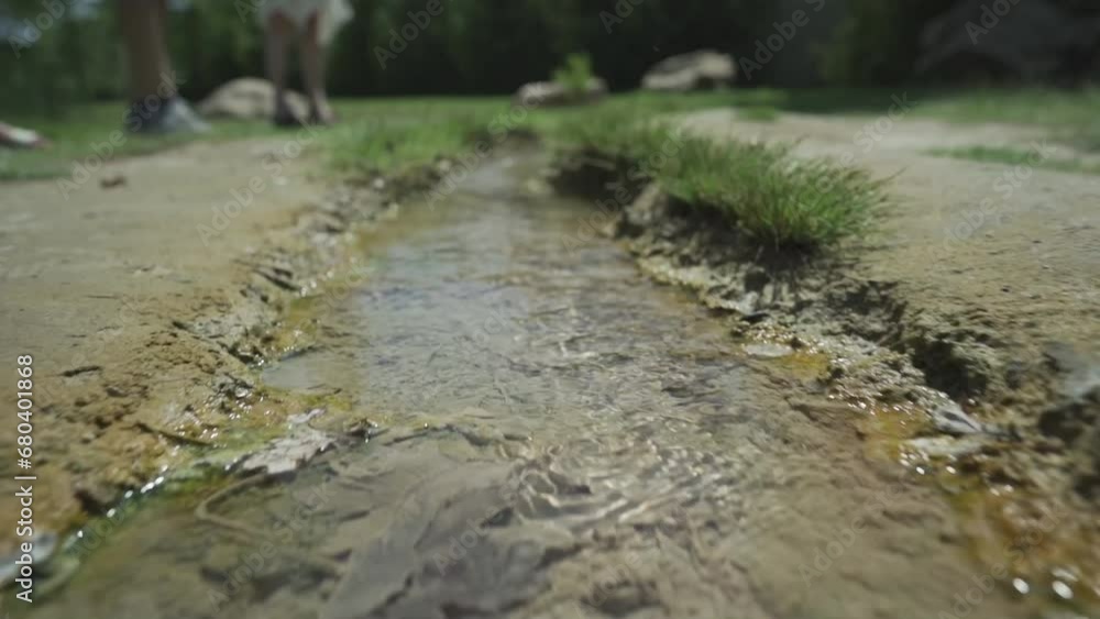 Following the flow of the crsytal clear, clean mineral waters found in the church yard of St. Petka church, near the town of Rupite, Petrich in Bulgaria.