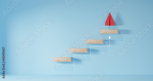 Wooden block stacking as step stair with red paper plane on blue background, Ladder of success in business growth concept.