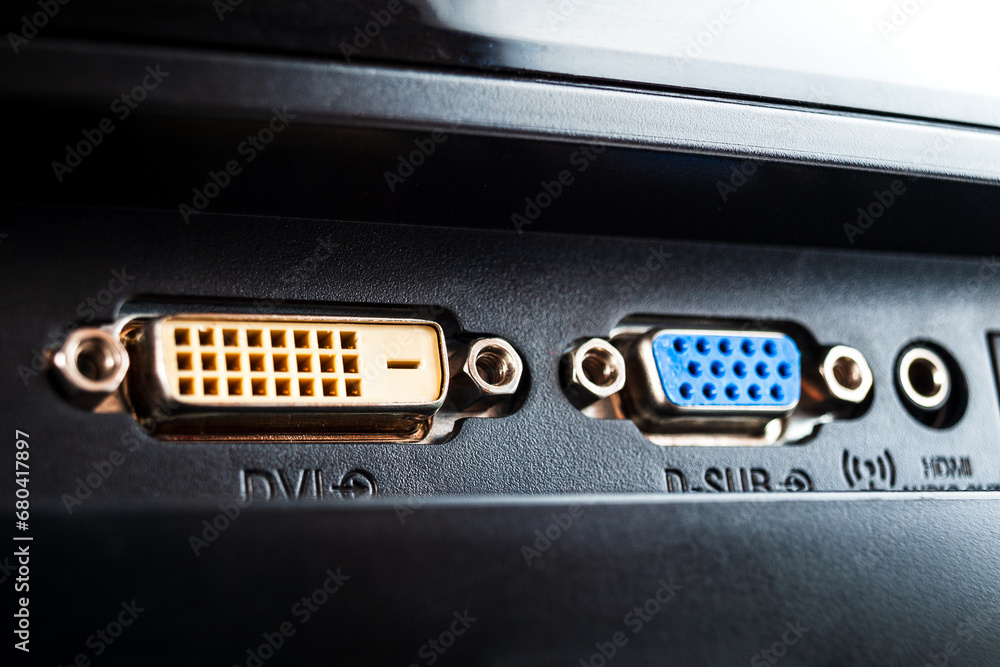 DVI HDMI digital and VGA analog video connector for connecting an external TV screen monitor to a computer laptop for watching video video signal transmission isolated on a white background DVI HDMI digital and VGA analog video connector for connecting an external TV screen monitor to a computer laptop for watching video video signal transmission isolated on a white background
