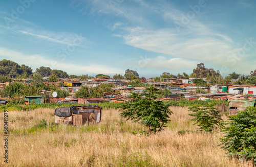 informal settlement with shack tin houses  in south africa in Gauteng province near a village photo