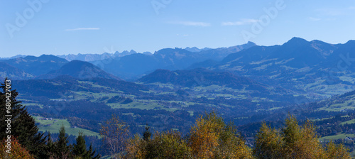 Beautiful green Alp mountains and hills from Pfaender Mountain in Bregenz