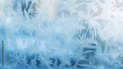 Frosty natural pattern on winter window glass  abstract winter background. 