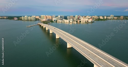 Wallpaper Mural Aerial view of Sarasota city downtown at sunset with Ringling Bridge and high-rise office buildings on horizon. Real estate development in Florida. USA travel destination Torontodigital.ca