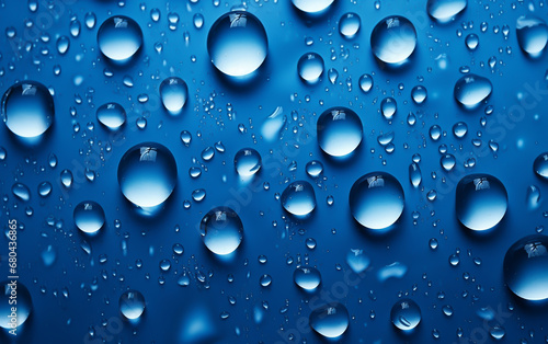 Water rain drops on blue background