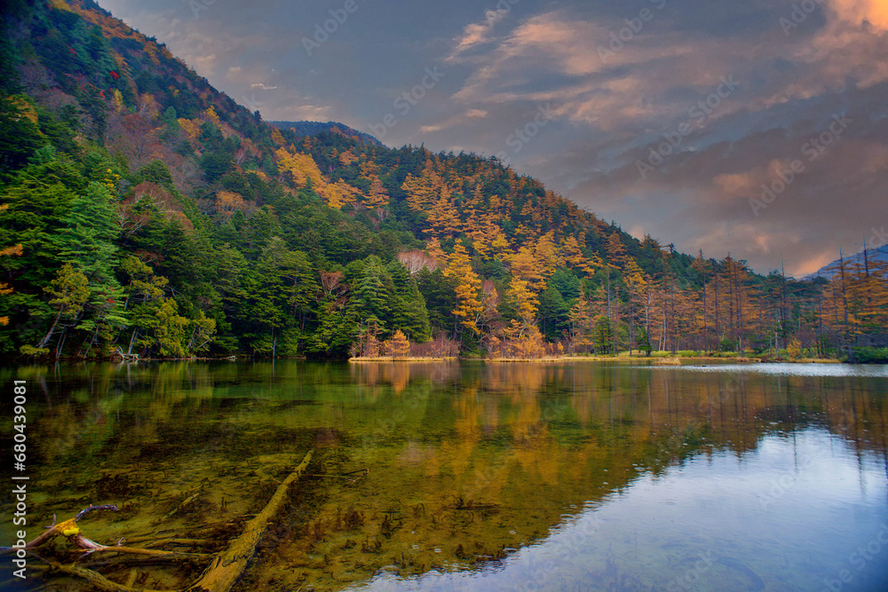 Idyllic landscape of Myojin pond at Hotaka Rear shrine in Kamikochi, Nagano, Japan (Japanese language meaning 