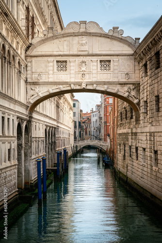Venice Bridge of Sighs above dark canal in dramatic light with copy space