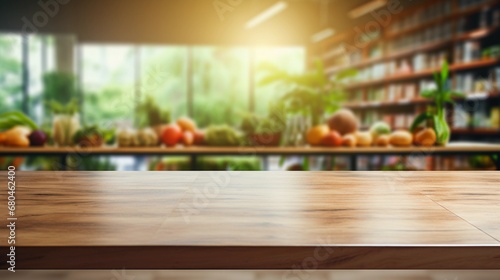Wooden table in a vegetable store, greengrocery full of fresh products, product presentation on a board photo