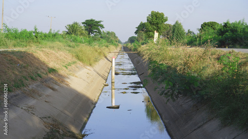 irrigation canal. Concrete irrigation canals that deliver water from reservoirs to Thai farmers. photo