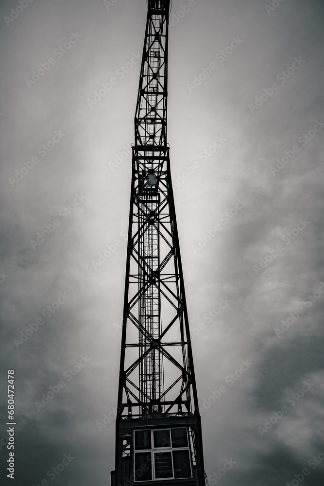 an industrial crane at the harbor with a view from below an industrial crane at the harbor with a view from below