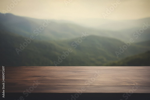 a rustic wooden table top with a blurred mountain valley background
