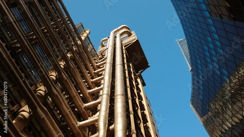 Bottom-up perspective of important and futuristic skyscrapers in the financial center of the City of London, England, UK. Great to illustrate the concept of business and trade  in a large metropolis photo
