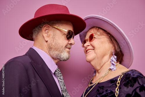 fashionable elderly couple