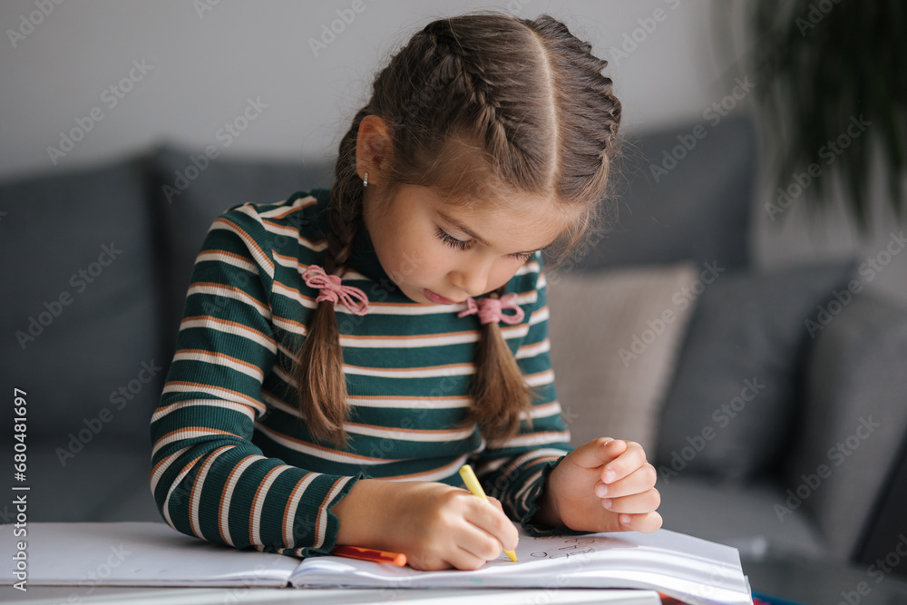 Close-up of adorable girl drawing. Creativity little girl painting at home. Close-up of adorable girl drawing. Creativity little girl painting at home.