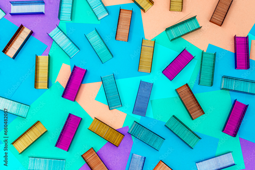 Multicolored office metal staples for stapler on multicolored paper Sticky Notes