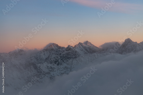 A sea of ​​clouds admired from the top of Kozi Wierch during an amazing sunset