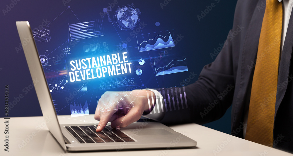 Businessman working on laptop, business concept Businessman working on laptop, business concept