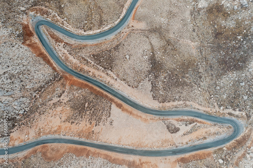 Aerial view of a road crossing the Nemrut mountains in autumn with clouds, Mount Nemrut, Turkey