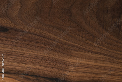 Black walnut wood texture with oil finish closeup