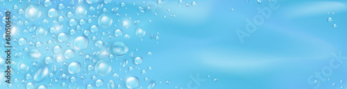 Soft blue blank billboard with realistic 3d pure water drops or condensation on surface. Panoramic banner with rain droplets or dew pattern as a frame. Aqua fresh header with empty place for text