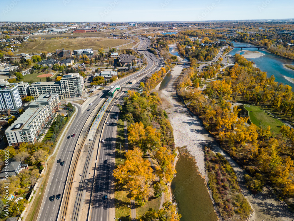 St. Patrick's Island Park and Bow River and Memorial Drive aerial view in autumn season. Fall foliage in City of Calgary, Alberta, Canada.