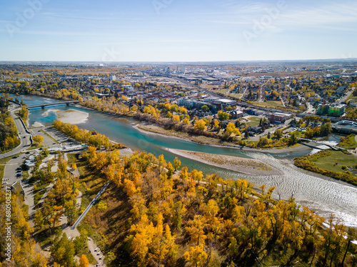 St. Patrick's Island Park and Bow River aerial view in autumn season. Fall foliage in City of Calgary, Alberta, Canada.