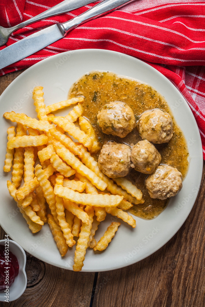 Meatballs with french fries in dill sauce. Meatballs with french fries in dill sauce.