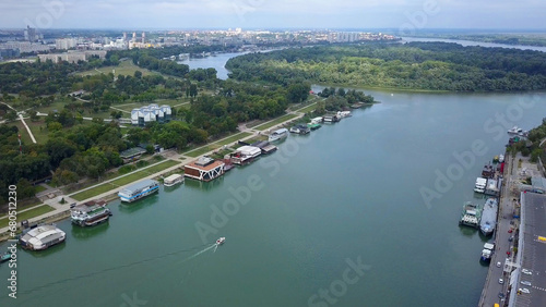 Daytime aerial shot in Belgrade, Serbia. Sava River and general city view