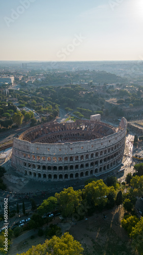 Aerial photography of the Roman Coliseum in the city of Rome in Italy. Travel in Europe. Travel agency.