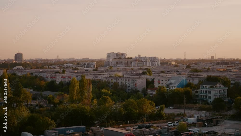 Cityscape skyline view from balcony in the evening. City landscape shot at twilight. Cityscape skyline view from balcony in the evening. City landscape shot at twilight.