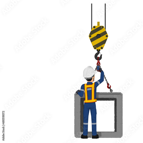 A worker is checking sling tag for making sure that the load is properly secured