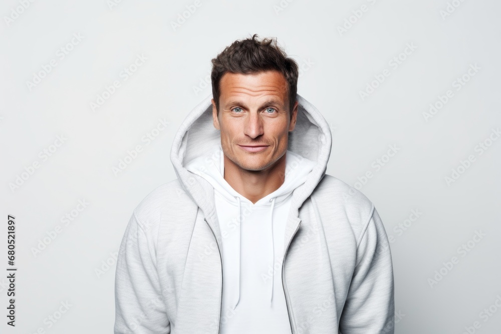 Portrait of a blissful man in his 30s wearing a zip-up fleece hoodie against a white background. AI Generation Portrait of a blissful man in his 30s wearing a zip-up fleece hoodie against a white background. AI Generation