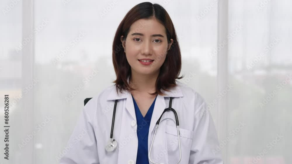 Attractive young female doctor discusses healthcare to patients by online video call consult on internet. Attractive young female doctor discusses healthcare to patients by online video call consult on internet.