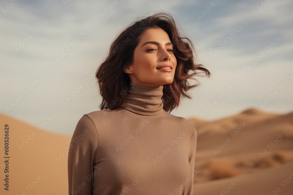Portrait of a blissful woman in her 30s wearing a classic turtleneck sweater against a backdrop of desert dunes. AI Generation Portrait of a blissful woman in her 30s wearing a classic turtleneck sweater against a backdrop of desert dunes. AI Generation
