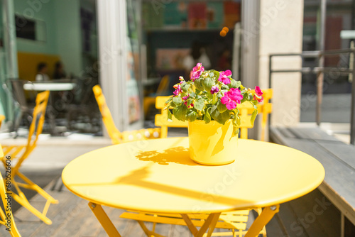 Empty table in outdoor cafe or restaurant. Tables and chairs at sidewalk cafe. Touristic setting  cafe table  sidewalk cafe furniture. High quality photo