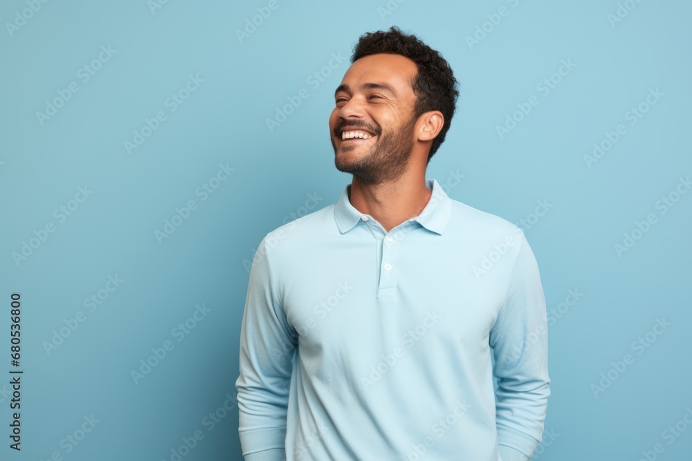 Portrait of a happy man in his 30s wearing a breathable golf polo against a soft blue background. AI Generation Portrait of a happy man in his 30s wearing a breathable golf polo against a soft blue background. AI Generation