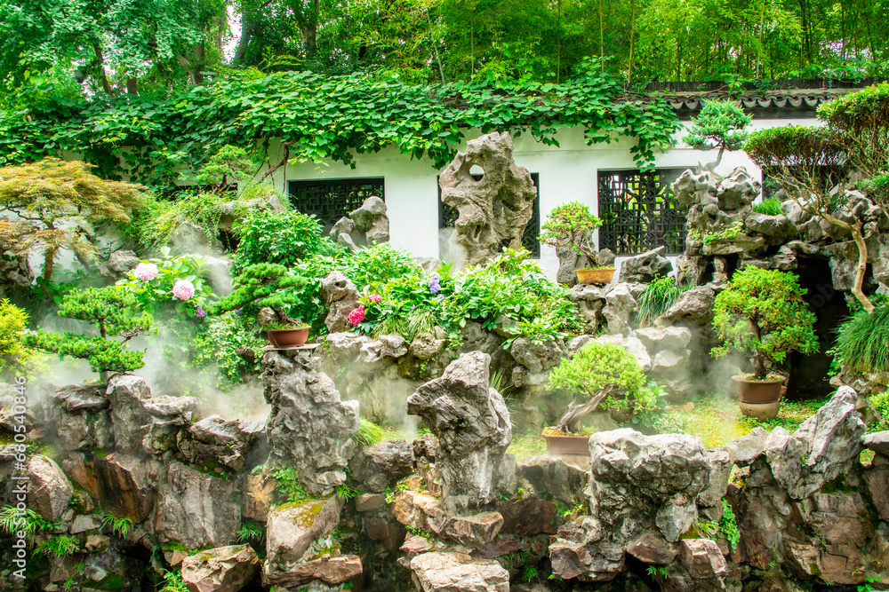 the beautiful view of Yu Garden. It is an extensive Chinese garden located beside the City God Temple in the northeast of the Old City of Shanghai at Huangpu District, Shanghai China. the beautiful view of Yu Garden. It is an extensive Chinese garden located beside the City God Temple in the northeast of the Old City of Shanghai at Huangpu District, Shanghai China.