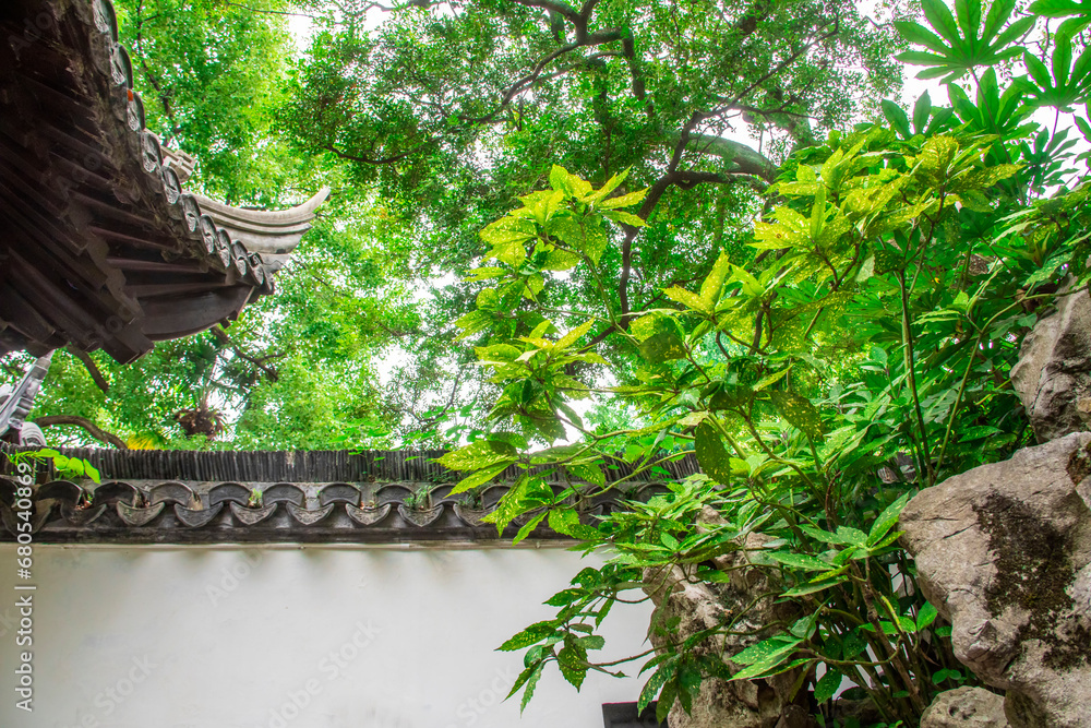 the beautiful view of Yu Garden. It is an extensive Chinese garden located beside the City God Temple in the northeast of the Old City of Shanghai at Huangpu District, Shanghai China. the beautiful view of Yu Garden. It is an extensive Chinese garden located beside the City God Temple in the northeast of the Old City of Shanghai at Huangpu District, Shanghai China.