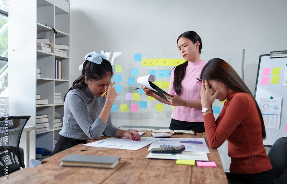 A team of female office workers is stressed over finding solutions to problems in meeting documents. The head of the organization blames the work for being unsuccessful. Discussion concept improvement A team of female office workers is stressed over finding solutions to problems in meeting documents. The head of the organization blames the work for being unsuccessful. Discussion concept improvement